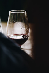 Naklejka na ściany i meble White, red and rose wine tasting close up view. Drop wine carafe.