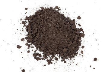 Heap of soil on a white background