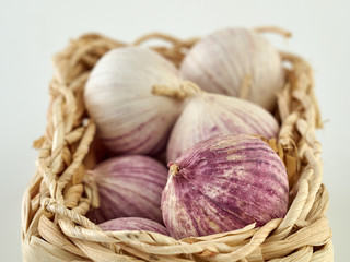 Fresh garlic on market table closeup photo