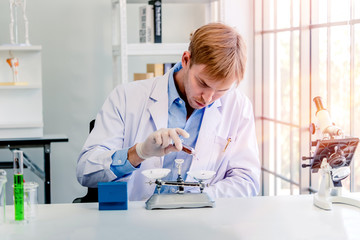 Scientists working in laboratory