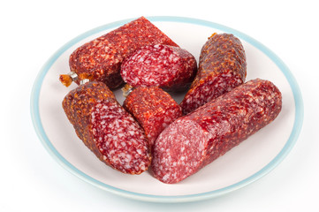 Smoked sausage in assortment on a plate