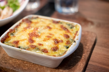Spinach lasagna with cheese Italian food style