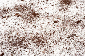 Scattered soil on a white background