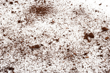 Scattered soil on a white background