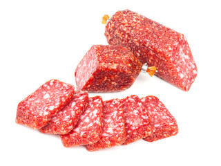 Sliced smoked sausage on white background