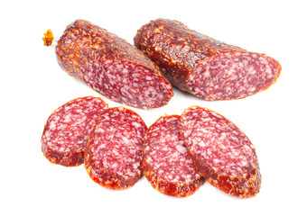 Sliced smoked sausage on white background