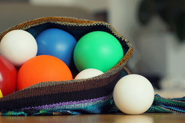 Close up of colorful different juggling balls in a bag