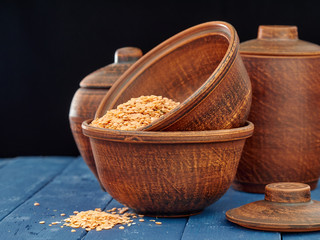 Ceramic cookware is on the boards of blue color