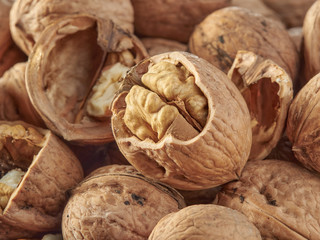 Walnuts lie on a light colored background