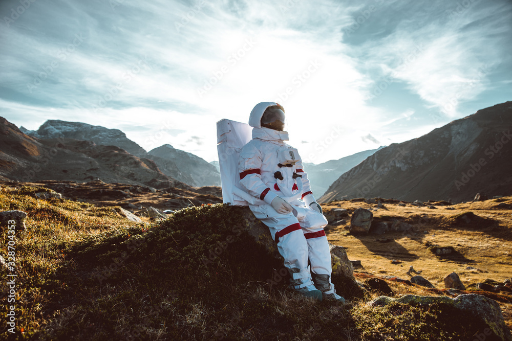 Poster astronaut exploring a new planet. searching for a new home for humanity. concept about science and n