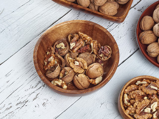 Walnuts lie on a light colored background