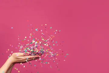 Foto op Canvas Falling confetti on bright pink background © artmim