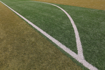 Obraz premium white curve on the green plastic playground