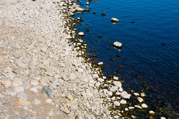 Stone beach. Nahuel Huapi Lake. Bariloche, Argentina