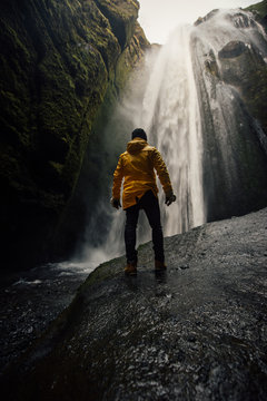 Man exploring iceland. Wanderlust explorer discovering icelandic natural wonders