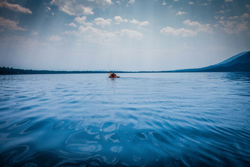 kayaking on mountain lake