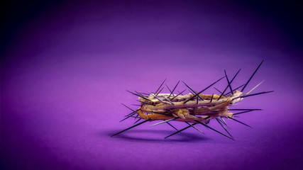 Lent Season,Holy Week and Good Friday concepts - photo of crown of thorns in purple vintage background