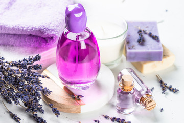 Lavender cosmetics on white background.