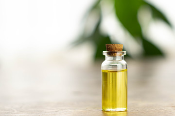 Bottle of cbd hemp essential oil made of marijuana on white background.  Medical, relaxing weed concept.