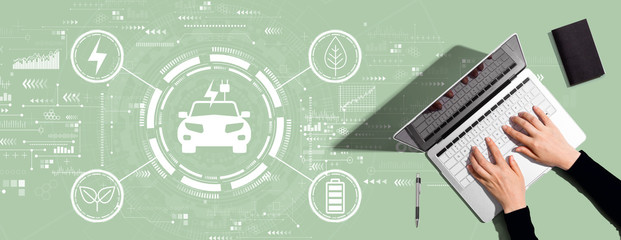 EV concept with person using a laptop computer
