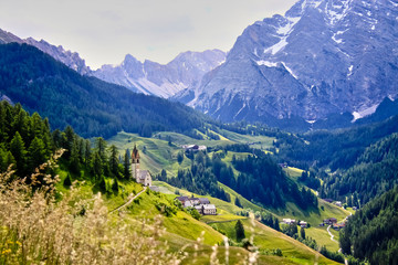 Naklejka na ściany i meble Alpine mountain landscape on a clear sunny day
