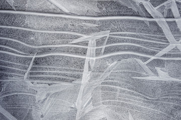 Abstract gray background. The backdrop of cracked ice