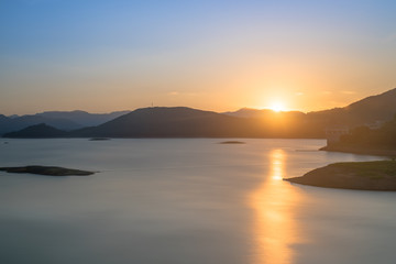 The reflection of the shape of the mountain on the lake