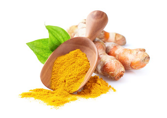 Turmeric powder and root with leaves