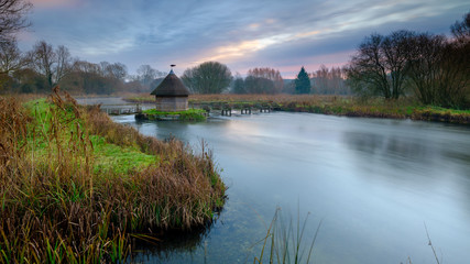 Fototapeta na wymiar The Bunny Eel House on the River Test at Longstock, Hampshire, UK