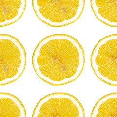 Seamless pattern of a whole round lemon wedges on a white background.