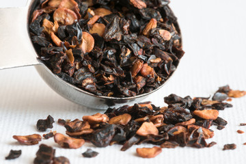 Chipotle Pepper Flakes Spilled from a Teaspoon