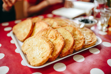 Fried bread breakfast with fruit jam. Balkan food. Bulgarian traditional cuisine.