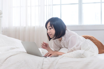 Portrait of beautiful asian young woman sleep lying in bed with head on pillow comfortable and happy with leisure, girl with relax for health and lifestyle concept.