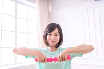 Fototapeta na wymiar Beautiful Asian girl, Fit sportswoman exercising and training at home