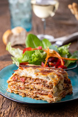 portion of fresh lasagna on a plate