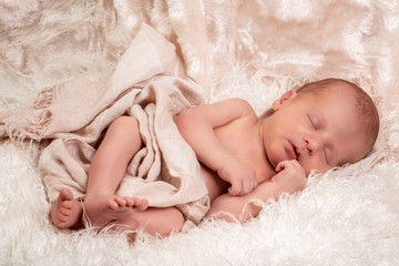 Newborn baby sleep first days of life. concept of happiness