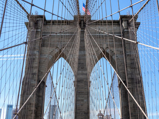 New York, NY, USA. Views of the Brooklyn bridge in a wonderful summer day. Walking from Manhattan to Brooklyn. Holiday time