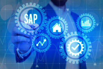 Handwriting text SAP. Conceptual photo SAP Business process automation software. ERP enterprise resources planning system concept on virtual screen. AI. Artificial intelligence.