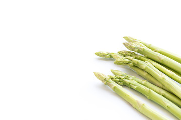 Fresh green asparagus isolated on white background.