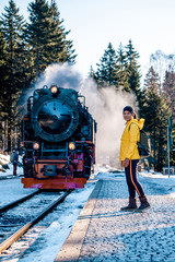 Harz national park Germany, historic steam train in the winter, Drei Annen Hohe, Germany,Steam locomotive of the Harzer Schmallspurbahnen in wintertime with snow.