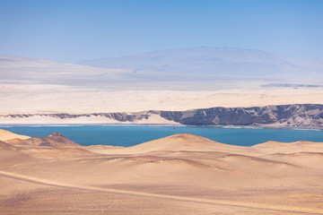 Naklejka premium View of Paracas National Reserve Bay, dunes, sands, desert. Peru.