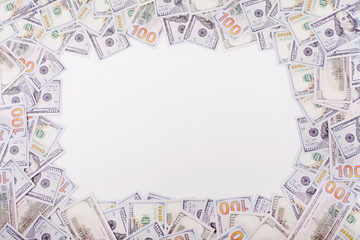 Fototapeta na wymiar Dollars on a white background, with space for text, with copy space. Concept backgrounds for financial topics, savings and salary.