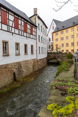 Fototapeta na wymiar Historic buildings and Erft river in Bad Muenstereifel