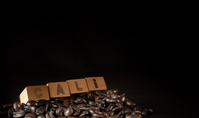 Colombian coffee cup on beans and dark background