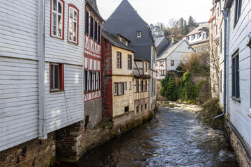 Fototapeta na wymiar Half-timbered houses along the rur river in Monschau,