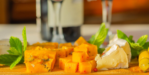 British hand-made and selected cheeses from local farms served on a wooden board