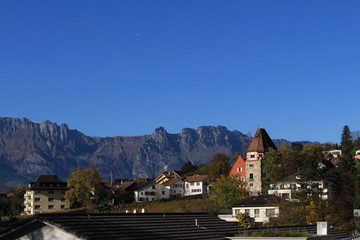 A view of Vaduz (the capital city of Liechtenstein in Europe) and Swiss Alps, taken from Vaduz Castle trail.