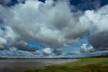 Obraz na płótnie Canvas Clouds over a Scottish River