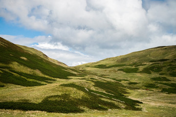 Fototapeta premium Scottish Landscape with Mountains and Clouds