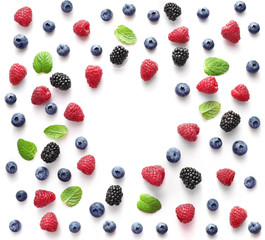 Frame of fresh berries on white background. Top view
